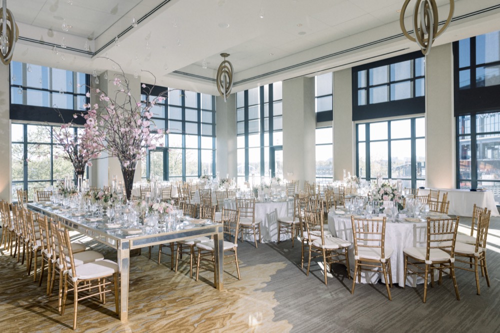 Ballroom set with gold chiavari chairs and mirrored tables